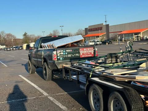 G.Burns team loading junk removal truck