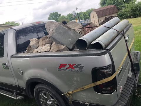 G.Burns Junk Removal team at work in Piqua Ohio